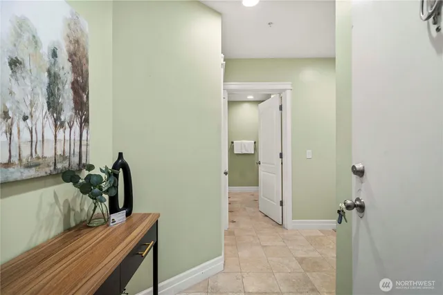 a kitchen with stainless steel appliances a sink stove and cabinets