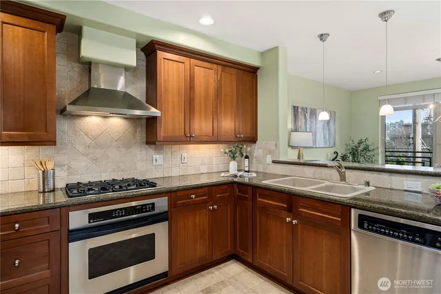 a view of a living room with a large window