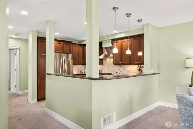 a view of a dining room with furniture