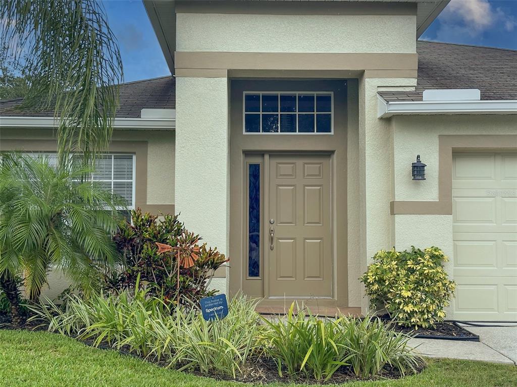13754 Royston Bend Hudson, FL 34669 - Photo 1 of 1 a view of front door of house