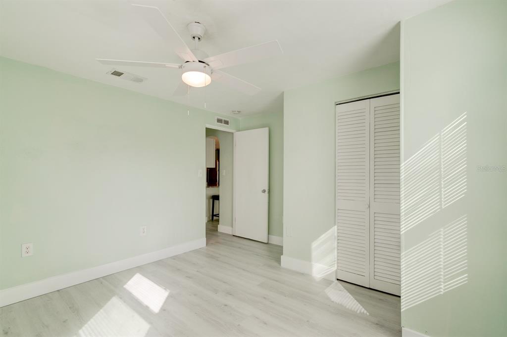 404 Adele Street Edgewater, FL 32132 - Photo 12 of 23 a view of an empty room with a window