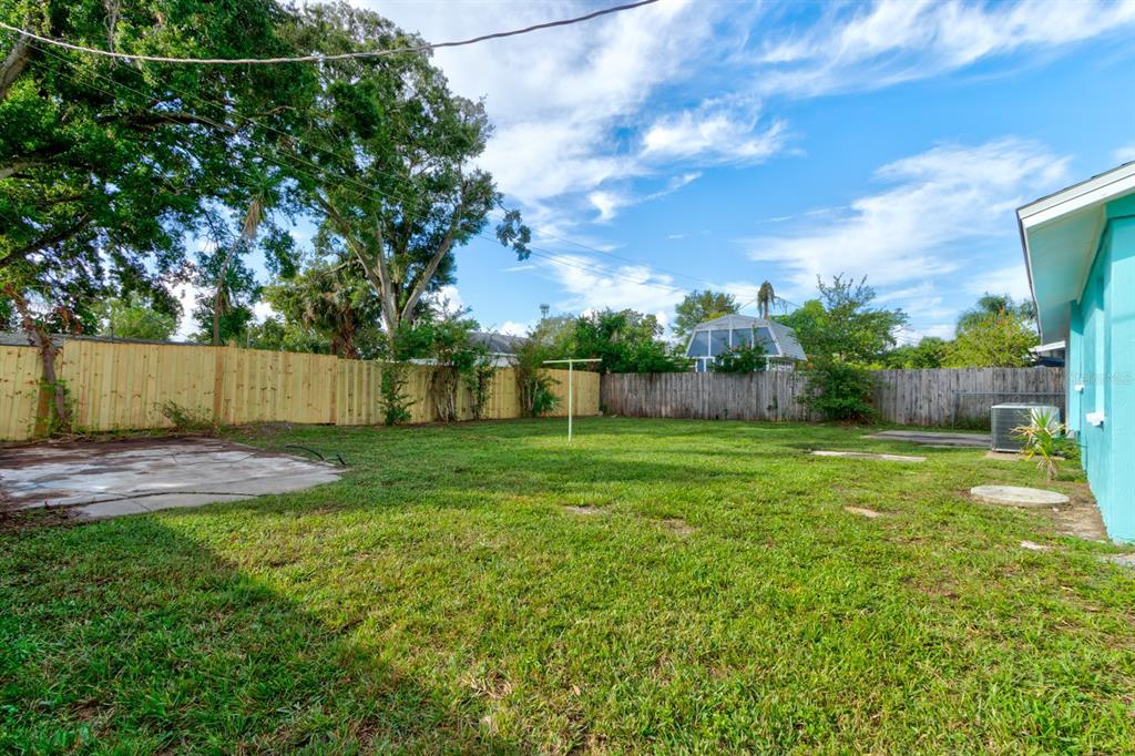 404 Adele Street Edgewater, FL 32132 - Photo 20 of 23 a view of a backyard