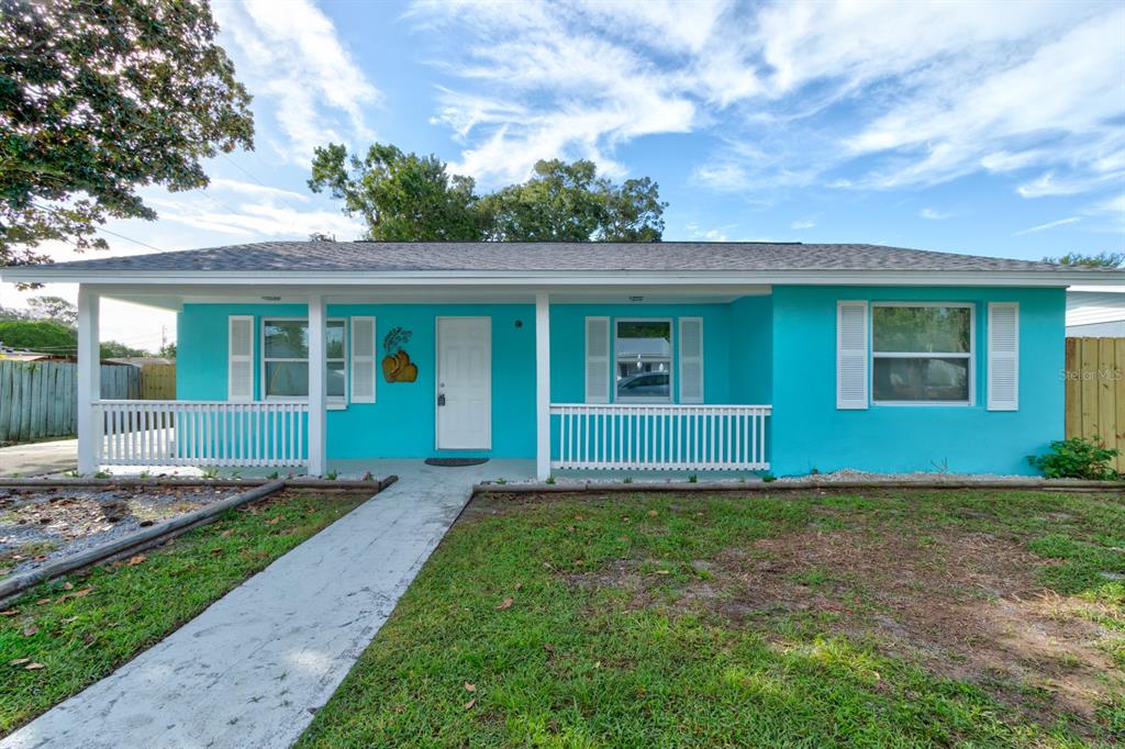 404 Adele Street Edgewater, FL 32132 - Photo 23 of 23 a view of front of a house with a yard