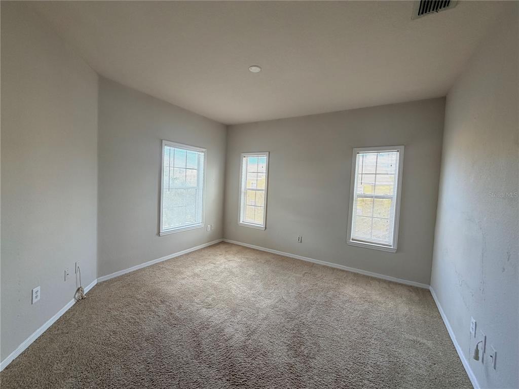 3561 Conroy Road, Unit 231 Orlando, FL 32839 - Photo 13 of 19 a view of empty room with windows