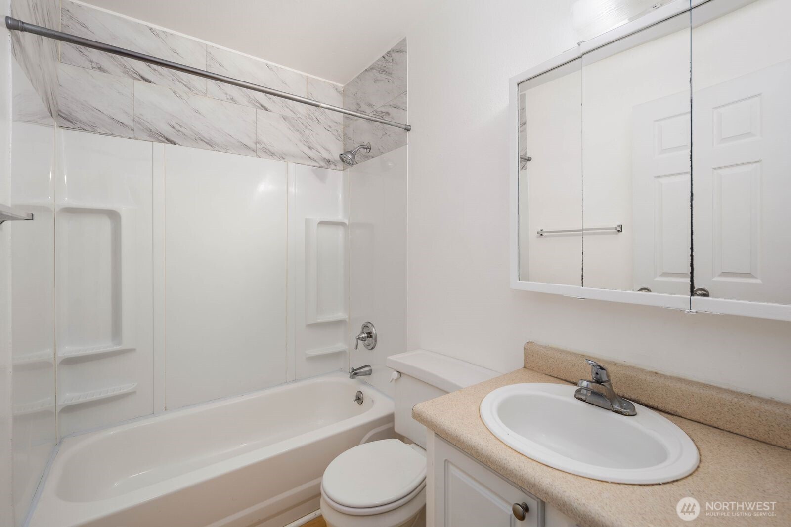 9623 South 248th Street, Unit C8 Kent, WA 98030 - Photo 17 of 37 a bathroom with a sink a toilet and bathtub