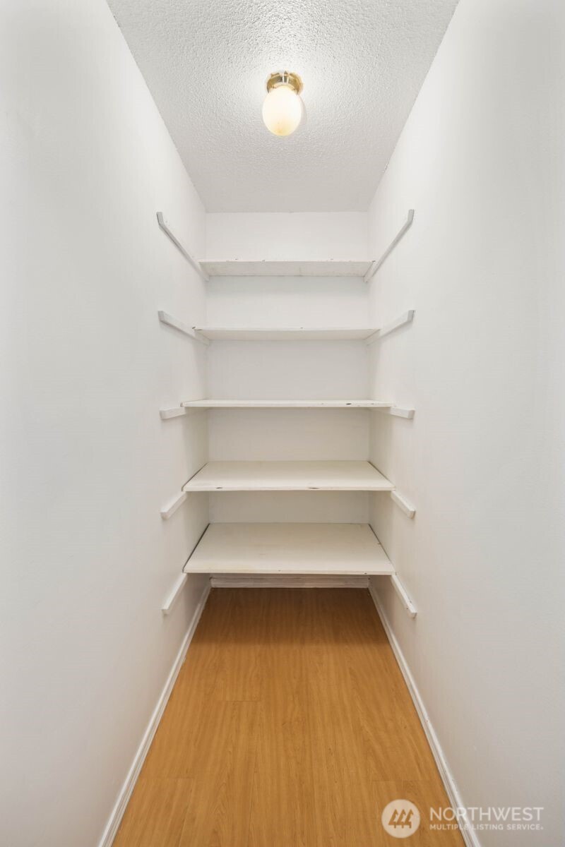 9623 South 248th Street, Unit C8 Kent, WA 98030 - Photo 22 of 37 a view of a room with shelves