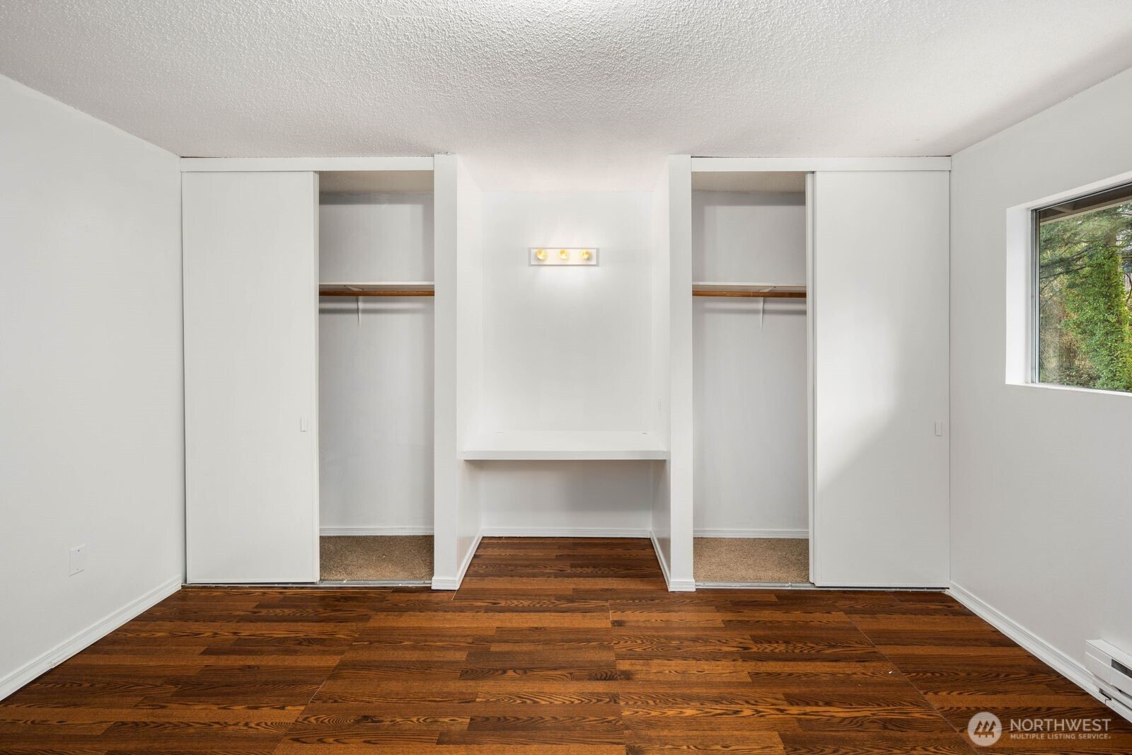 9623 South 248th Street, Unit C8 Kent, WA 98030 - Photo 6 of 37 a view of empty room with wooden floor