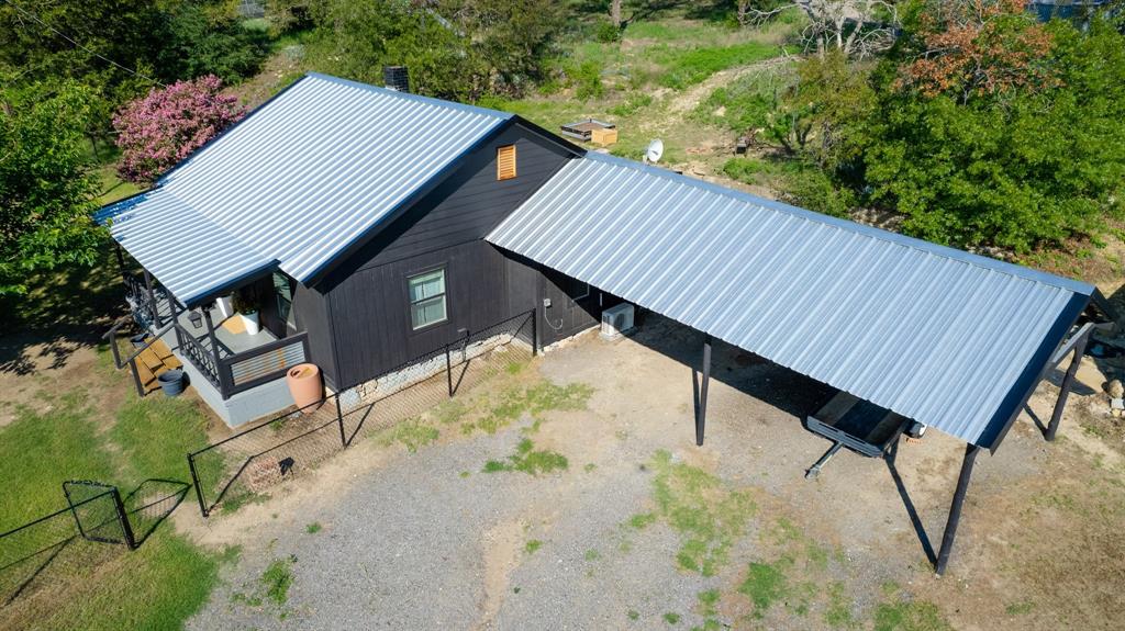 1550 South Stewart Street Azle, TX 76020 - Photo 4 of 35 an aerial view of a house having yard
