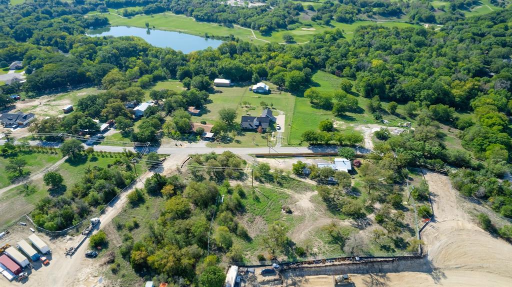1550 South Stewart Street Azle, TX 76020 - Photo 6 of 35 an aerial view of residential house with outdoor space and trees all around