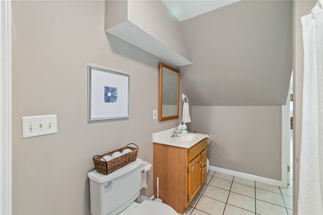 5817 East Henrietta Road Rush, NY 14543 - Photo 16 of 47 The first level FULL BATH - tiled floor too!