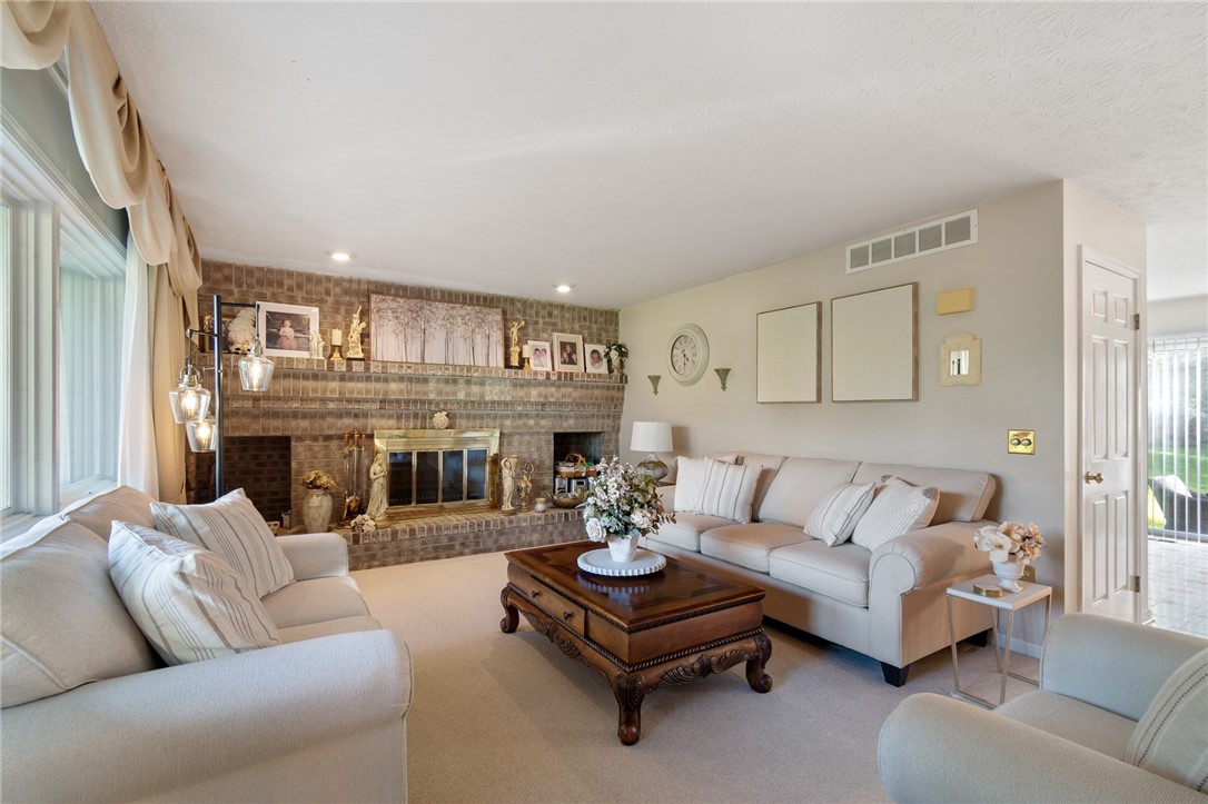 5817 East Henrietta Road Rush, NY 14543 - Photo 23 of 47 The first floor living room - expertly finished br