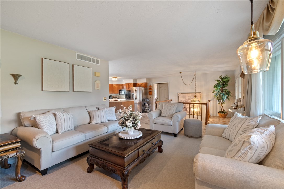 5817 East Henrietta Road Rush, NY 14543 - Photo 25 of 47 The living room- first floor - there’s another in