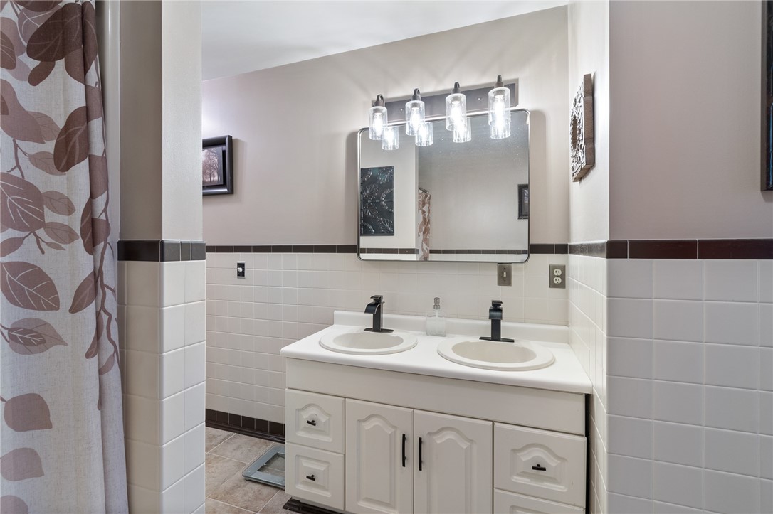 5817 East Henrietta Road Rush, NY 14543 - Photo 41 of 47 Update double sinks and faucets in this FULL BATH-