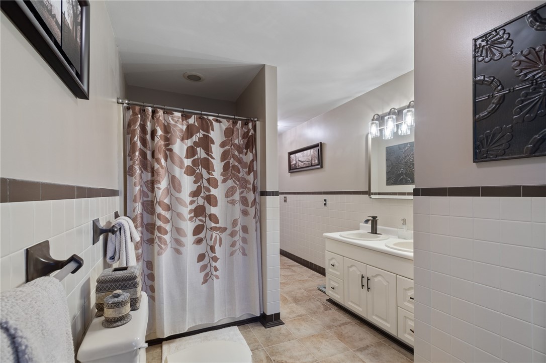 5817 East Henrietta Road Rush, NY 14543 - Photo 43 of 47 Updated bathroom- new double sinks and faucets