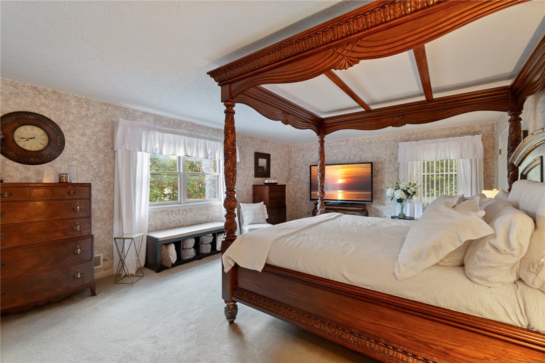 5817 East Henrietta Road Rush, NY 14543 - Photo 45 of 47 The PRIMARY bedroom- spacious AND luxurious!