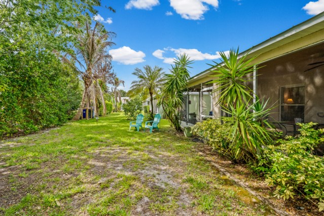 131 Bellamy Trail Sebastian, FL 32958 - Photo 24 of 32 a view of backyard of house with green space