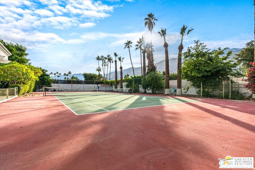 875 Tamarisk Road Palm Springs, CA 92262 - Photo 40 of 55 a view of a playground with basketball court