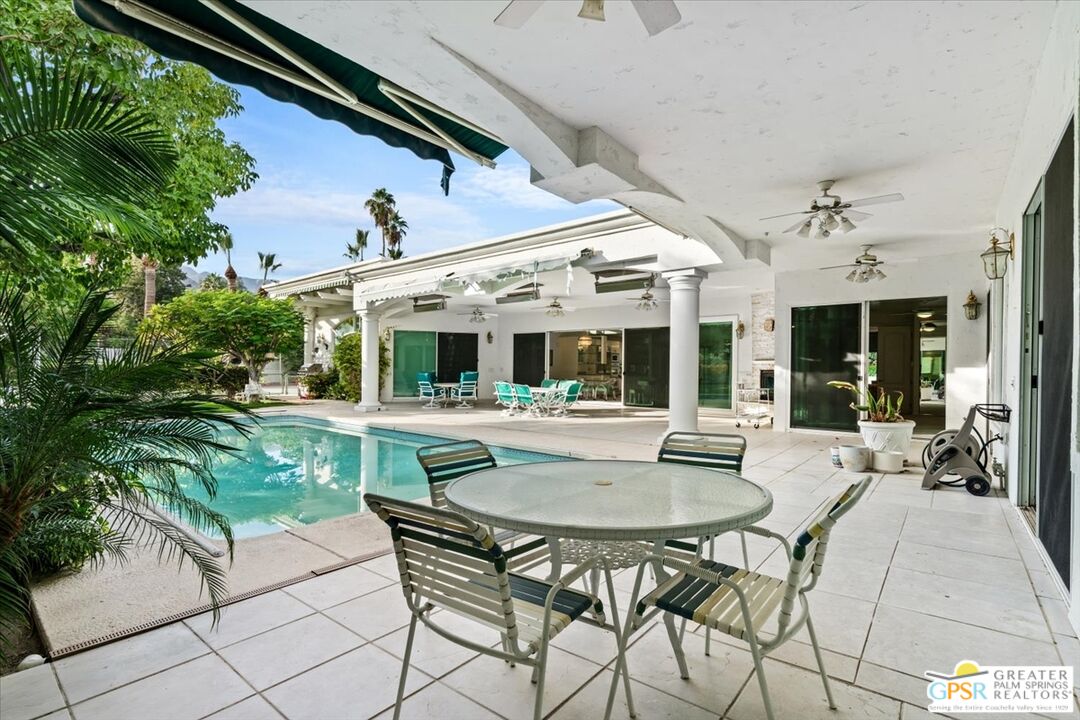 875 Tamarisk Road Palm Springs, CA 92262 - Photo 45 of 55 a view of a house with backyard and sitting area