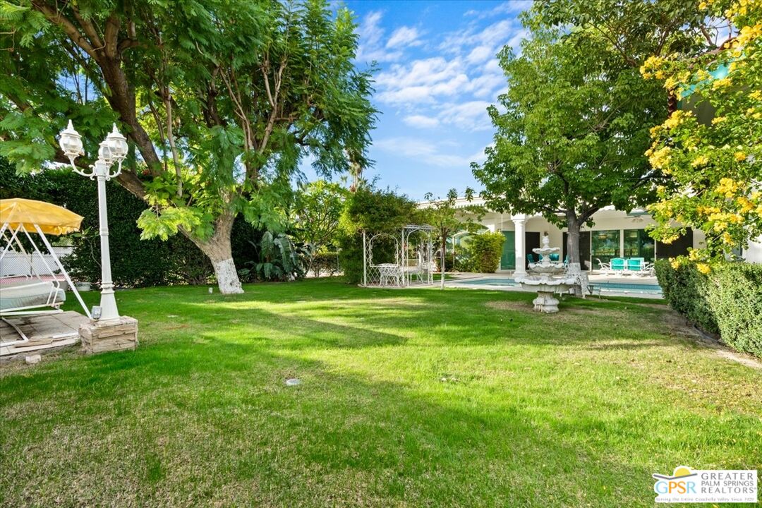 875 Tamarisk Road Palm Springs, CA 92262 - Photo 47 of 55 a view of a park with plants and trees