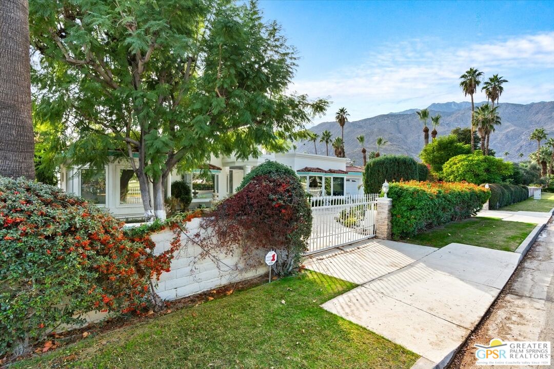 875 Tamarisk Road Palm Springs, CA 92262 - Photo 51 of 55 a front view of a house with garden