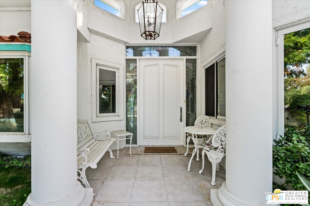 875 Tamarisk Road Palm Springs, CA 92262 - Photo 10 of 55 a view of a entryway with patio