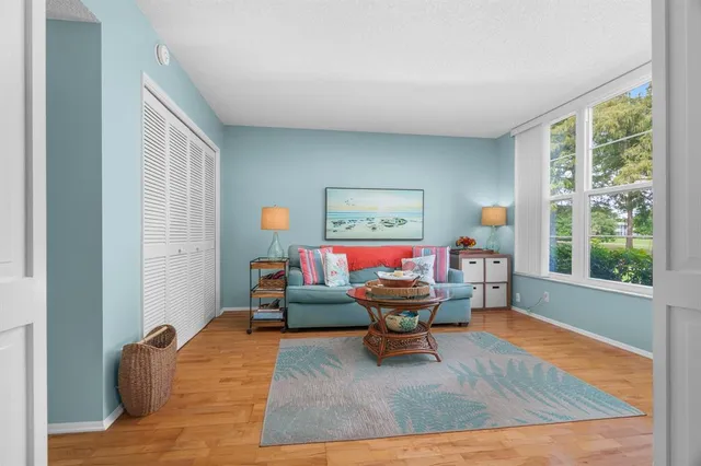 a living room with furniture and a window