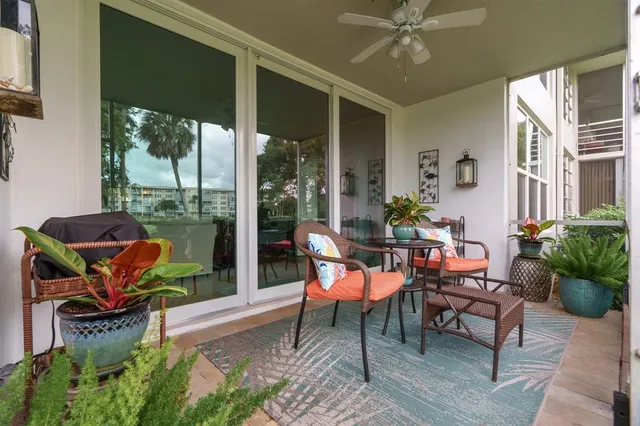 a outdoor living space with furniture and garden view