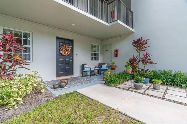 a front view of building with yard