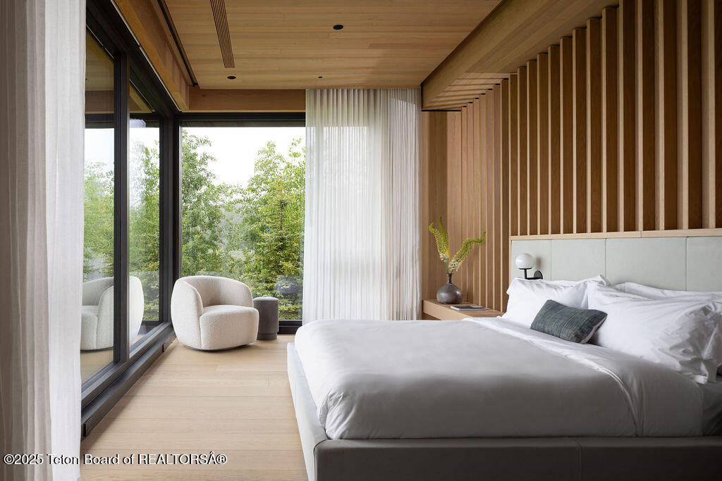 2205 Pemmican Road Jackson, WY 83001 - Photo 11 of 31 Primary Suite Bedroom