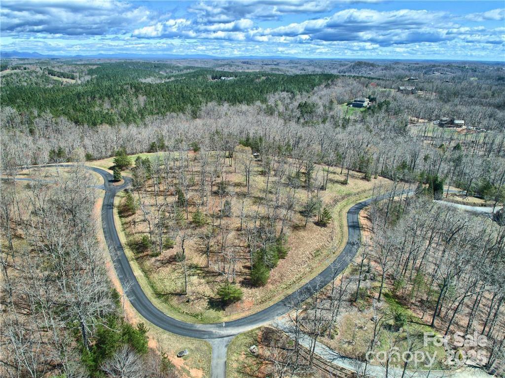 a view of a wooden floor with a yard