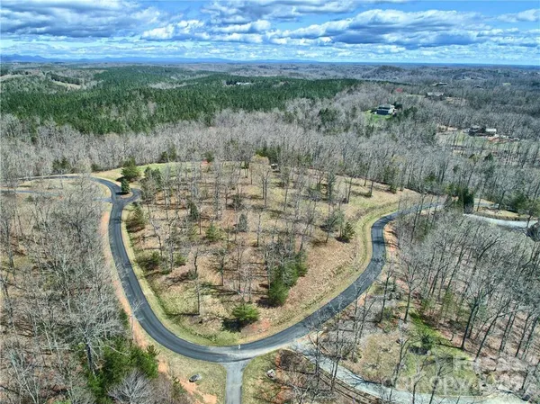 a view of a wooden floor with a yard