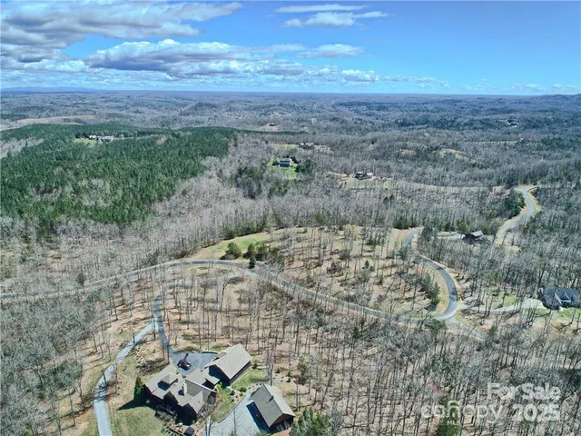 a view of a yard with an outdoor space