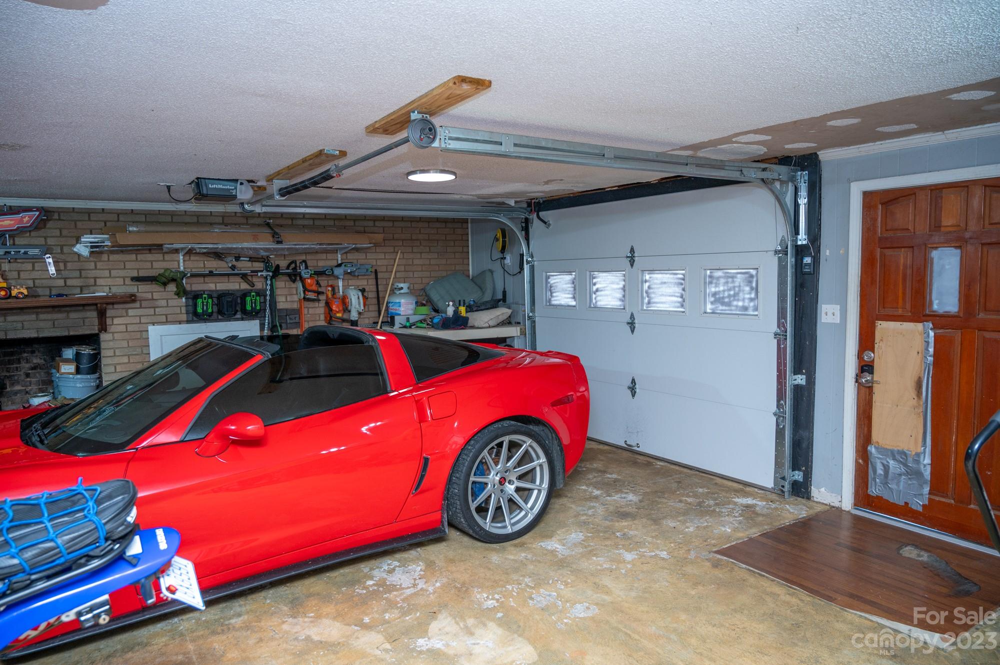 6600 Barrier Store Road Mount Pleasant, NC 28124 - Photo 12 of 21 a car is parked in a garage