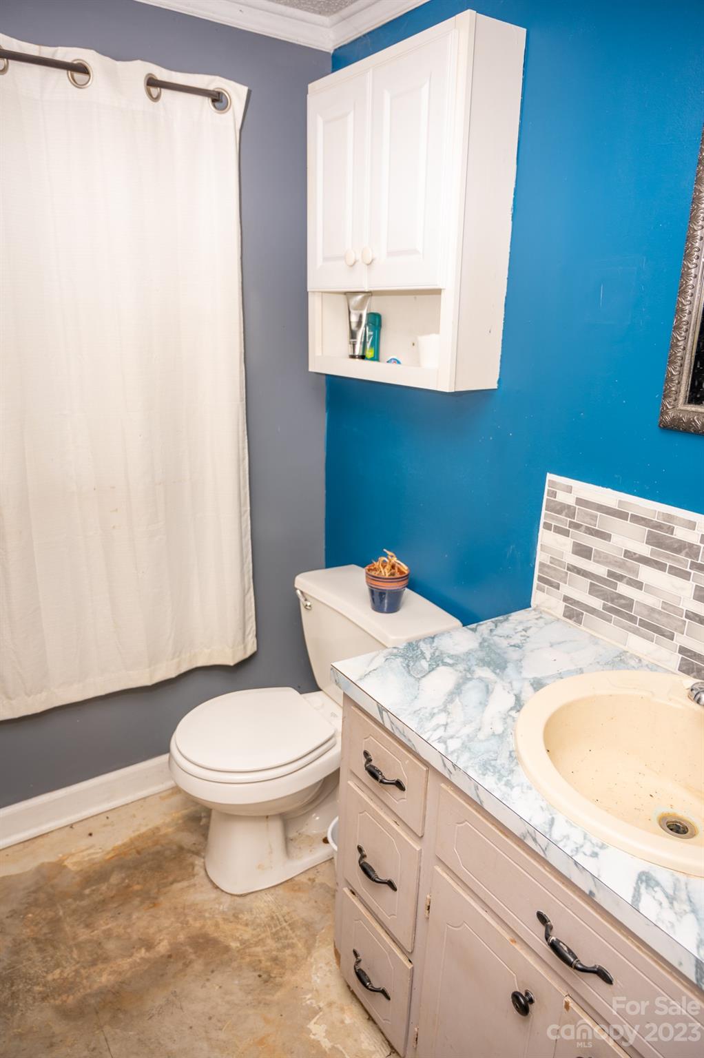 6600 Barrier Store Road Mount Pleasant, NC 28124 - Photo 13 of 21 a bathroom with a granite countertop sink toilet and mirror