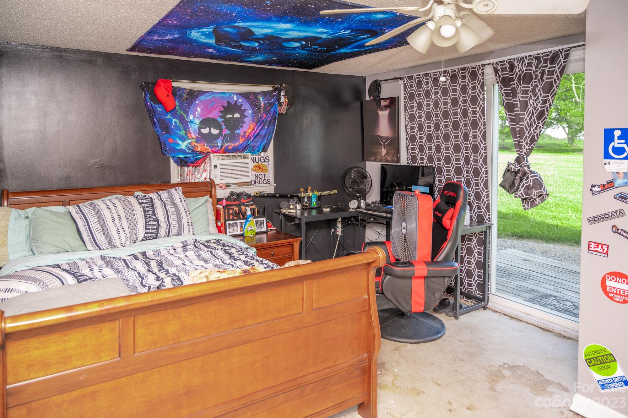 6600 Barrier Store Road Mount Pleasant, NC 28124 - Photo 14 of 21 a living room with furniture and a flat screen tv