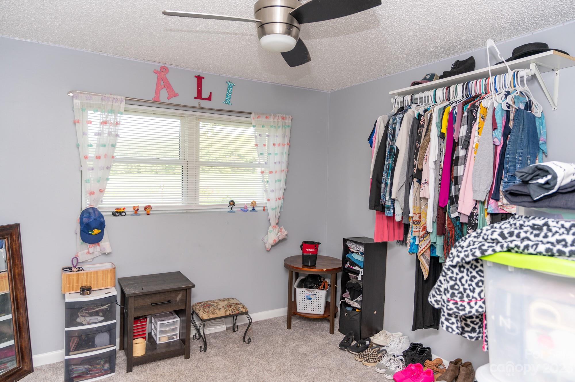 6600 Barrier Store Road Mount Pleasant, NC 28124 - Photo 16 of 21 a view of a workspace with furniture and a window