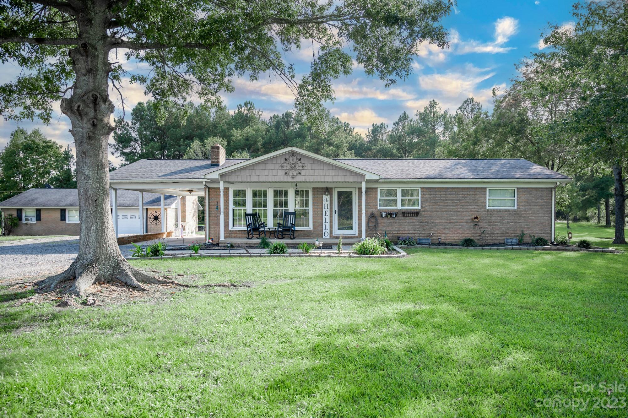 6600 Barrier Store Road Mount Pleasant, NC 28124 - Photo 21 of 21 a front view of a house with a garden