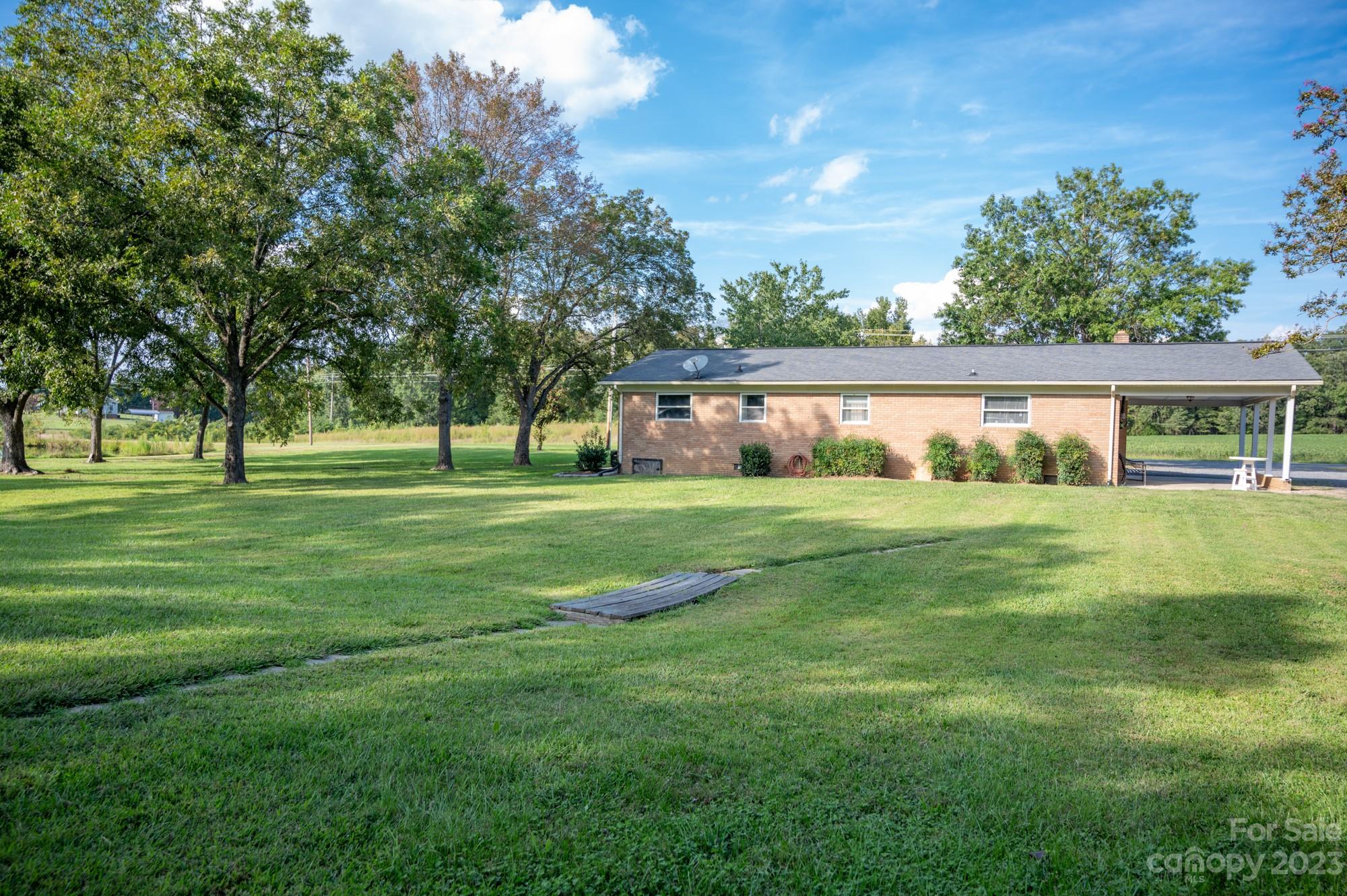 6600 Barrier Store Road Mount Pleasant, NC 28124 - Photo 9 of 21 a house view with a garden space