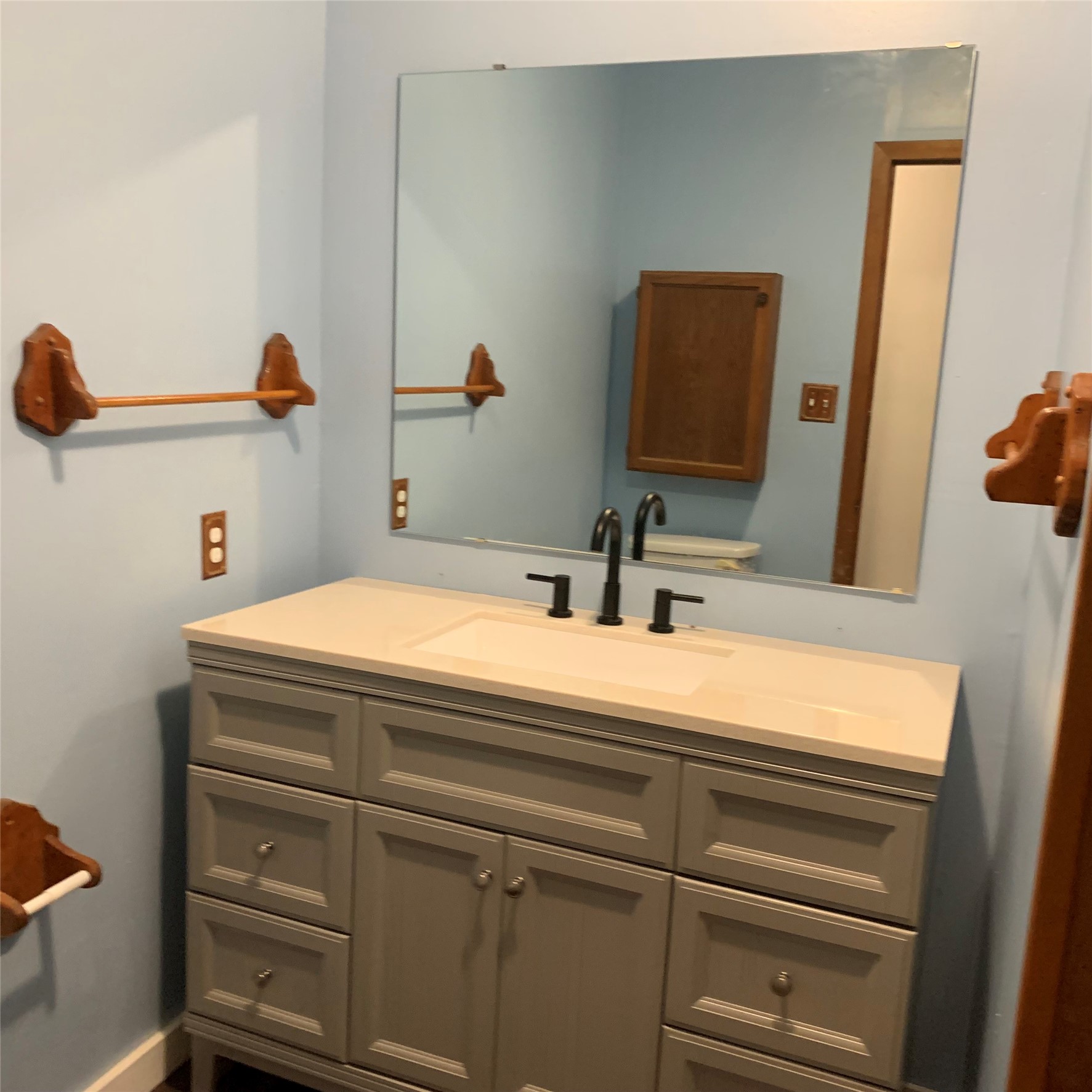 324 Persimmon Road Onalaska, TX 77360 - Photo 15 of 41 a bathroom with a sink and a mirror