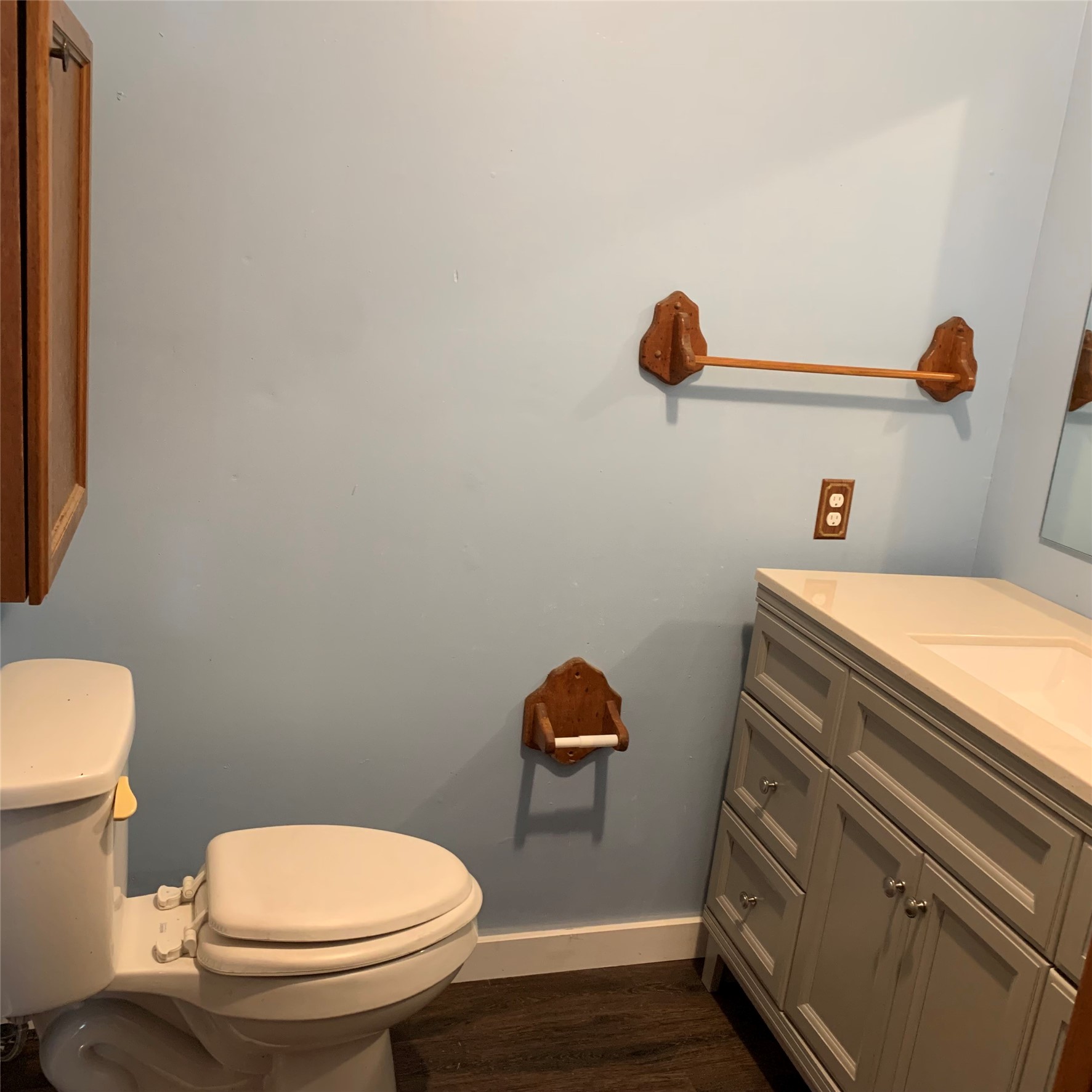 324 Persimmon Road Onalaska, TX 77360 - Photo 16 of 41 a bathroom with a sink a toilet and a mirror