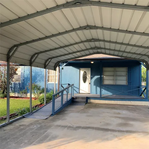 a front view of a house with a garage