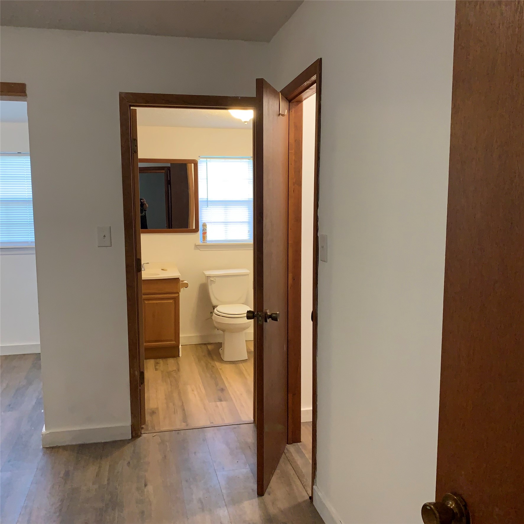 324 Persimmon Road Onalaska, TX 77360 - Photo 21 of 41 a bathroom with a glass door shower and a toilet