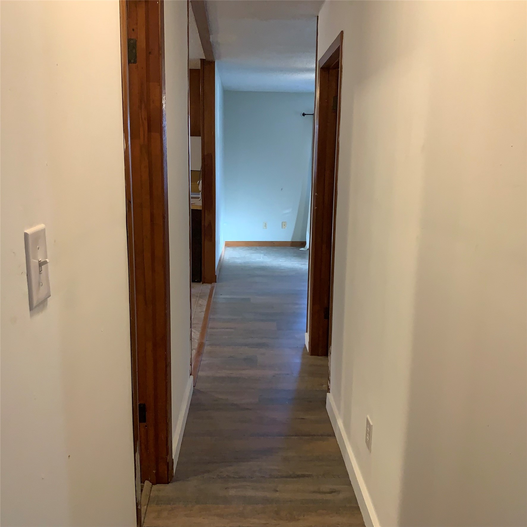 324 Persimmon Road Onalaska, TX 77360 - Photo 28 of 41 a view of a hallway with wooden floor