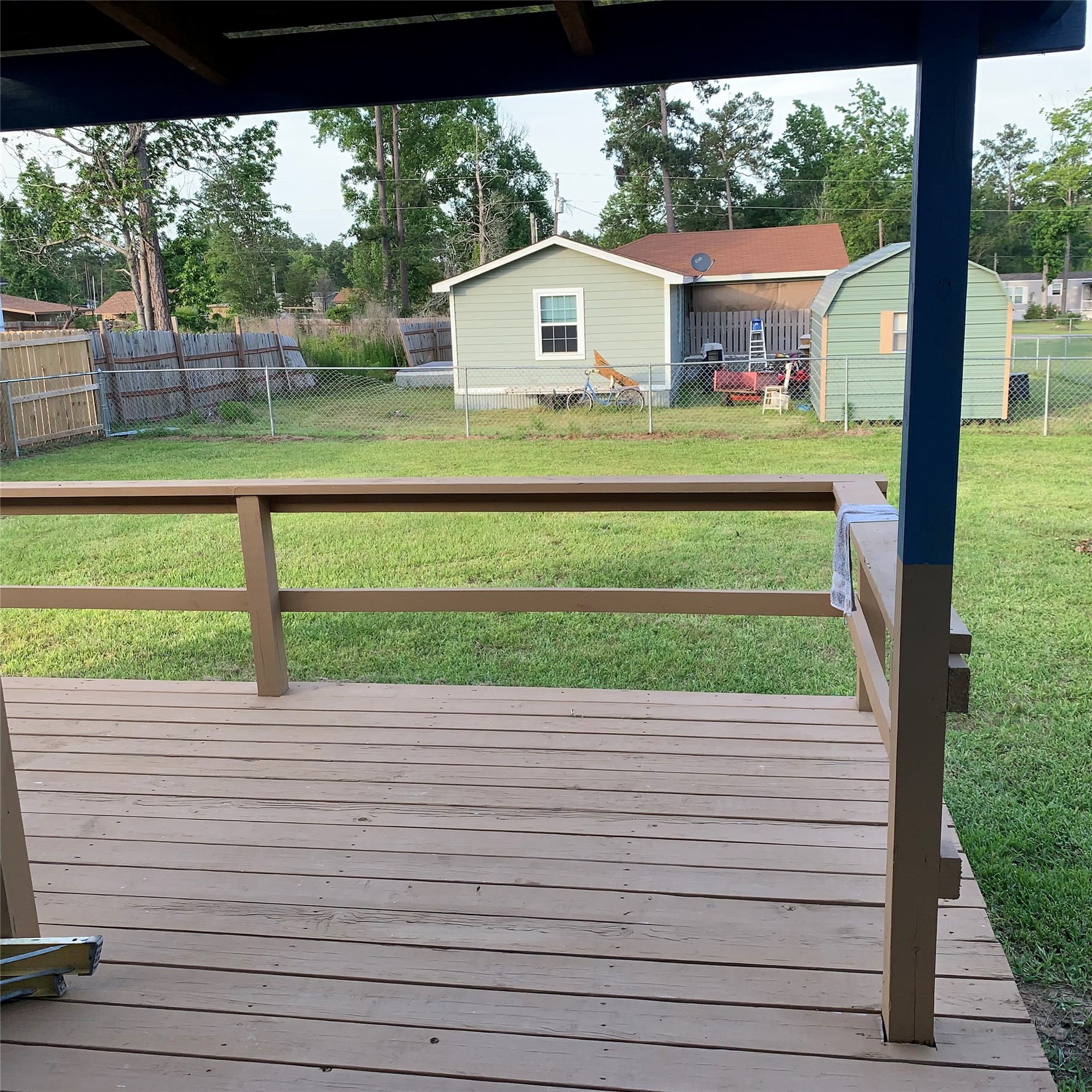 324 Persimmon Road Onalaska, TX 77360 - Photo 31 of 41 a house view with a garden space