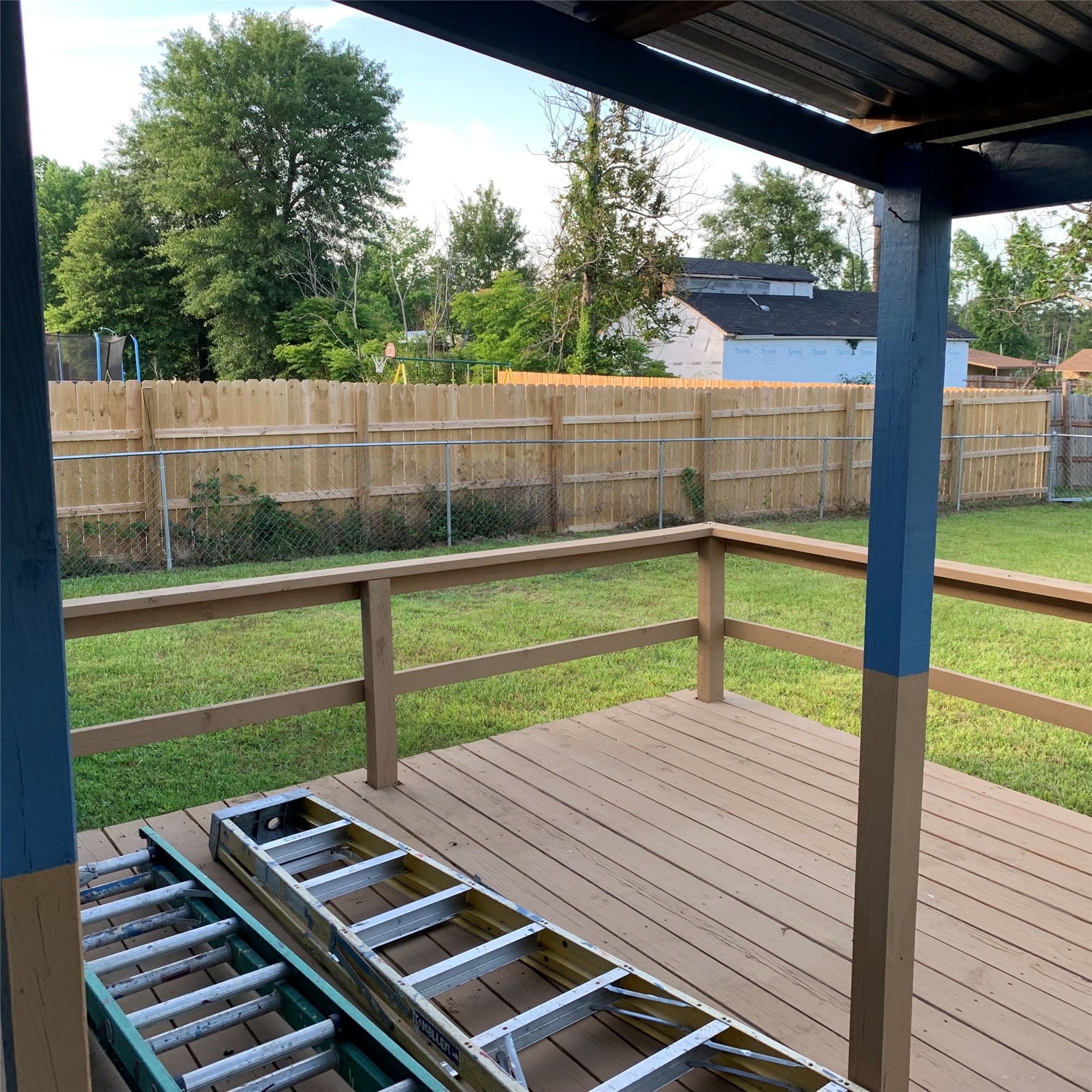 324 Persimmon Road Onalaska, TX 77360 - Photo 32 of 41 a view of a wooden deck with a yard