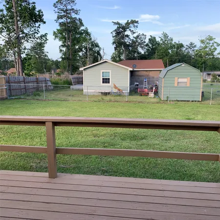 a house view with a garden space