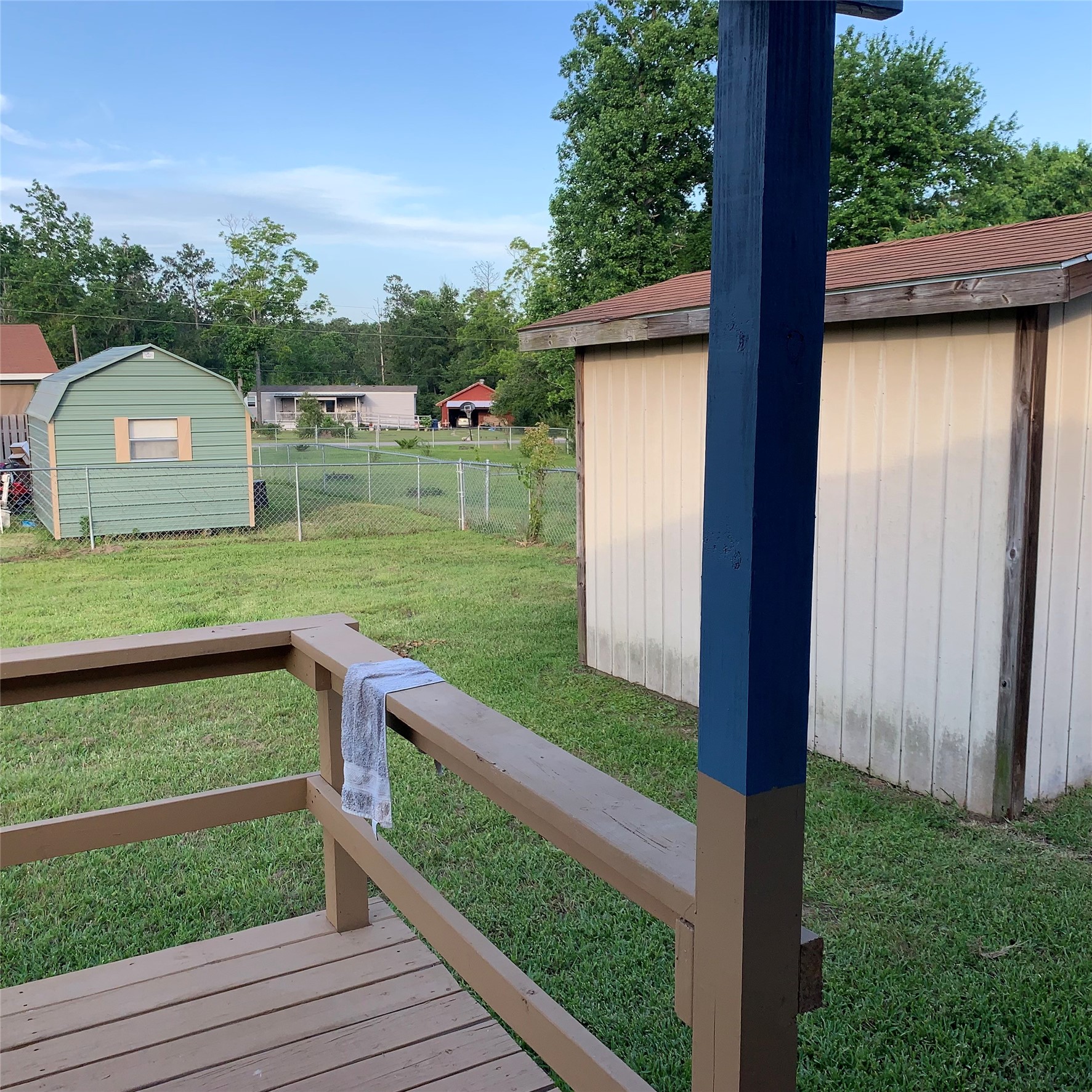 324 Persimmon Road Onalaska, TX 77360 - Photo 36 of 41 a view of a wooden deck and a yard