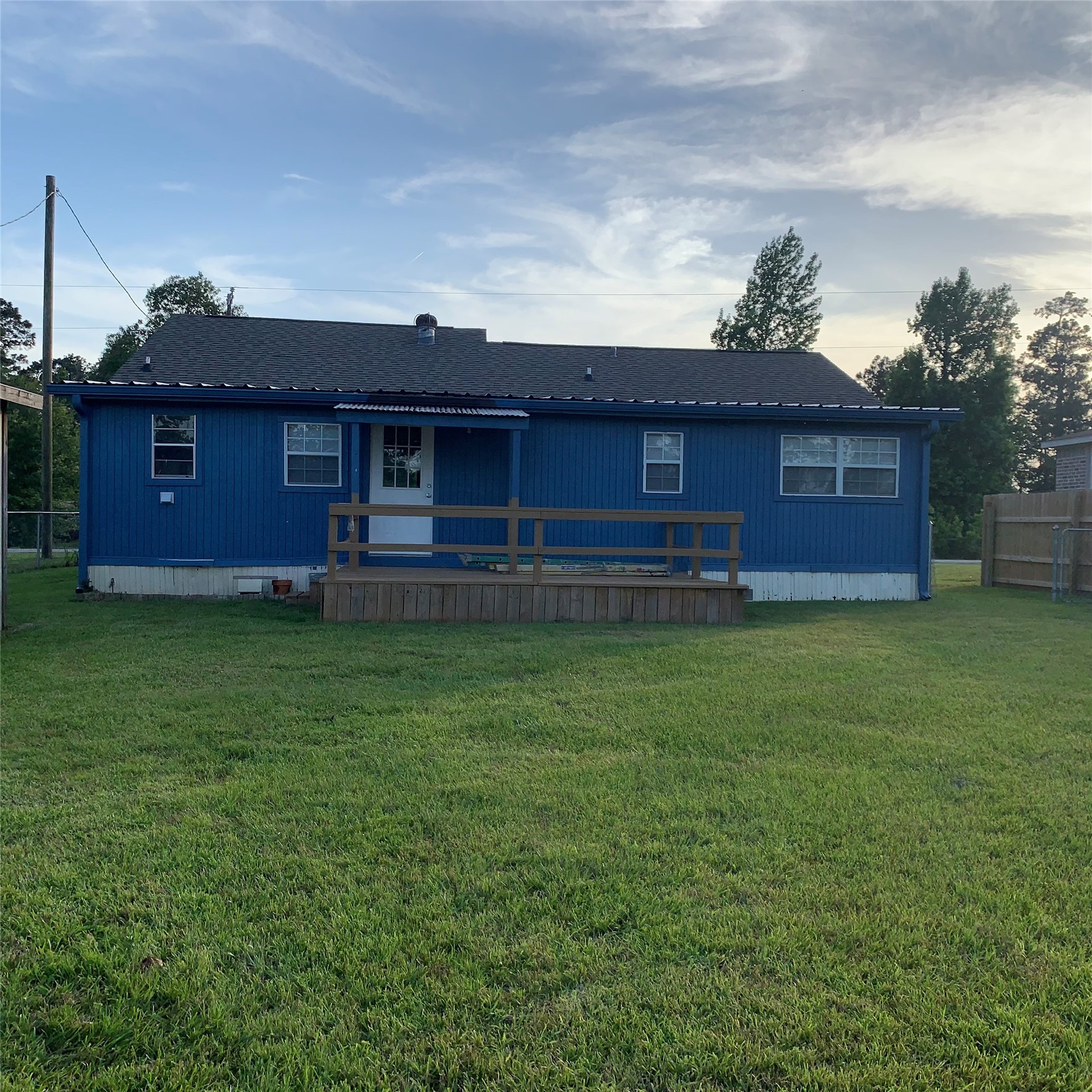 324 Persimmon Road Onalaska, TX 77360 - Photo 40 of 41 a view of a house with a yard