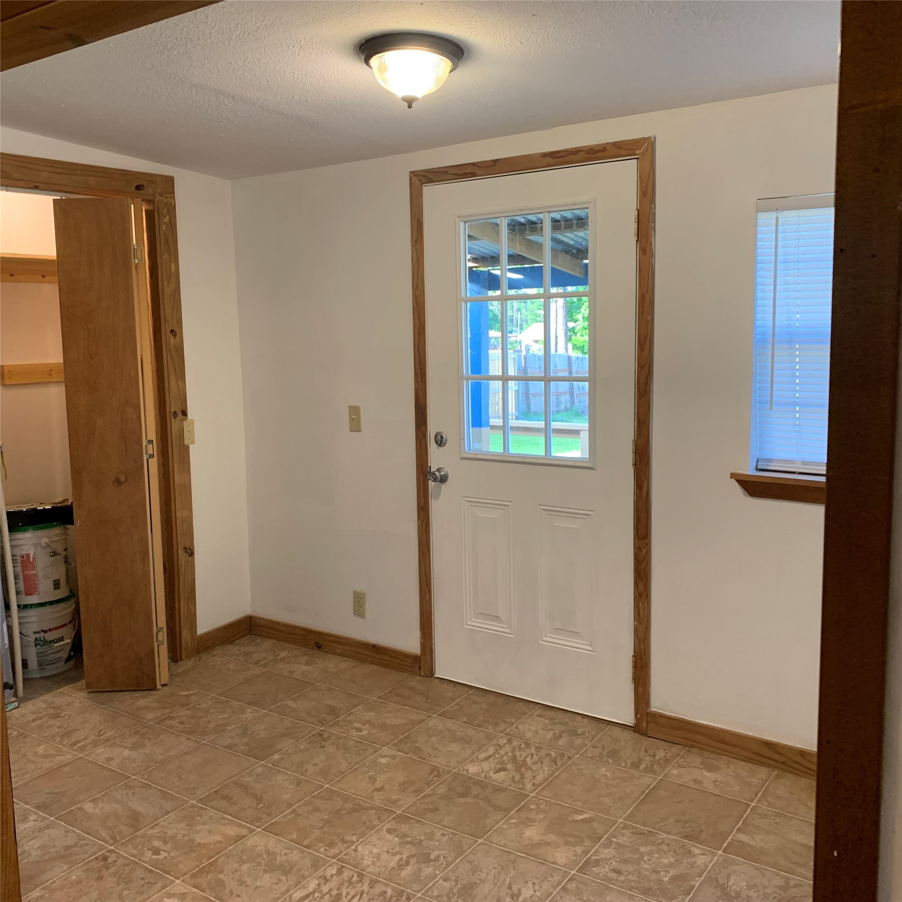 324 Persimmon Road Onalaska, TX 77360 - Photo 10 of 41 an empty room with windows