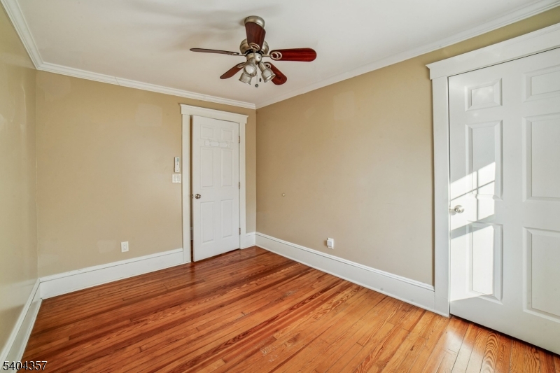 169 Diamond Spring Road Denville, NJ 07834 - Photo 25 of 31 a view of room with hardwood floor and window